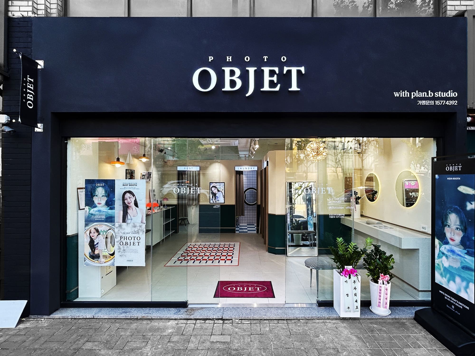 PHOTO OBJET storefront with themed booth interiors visible through the glass
