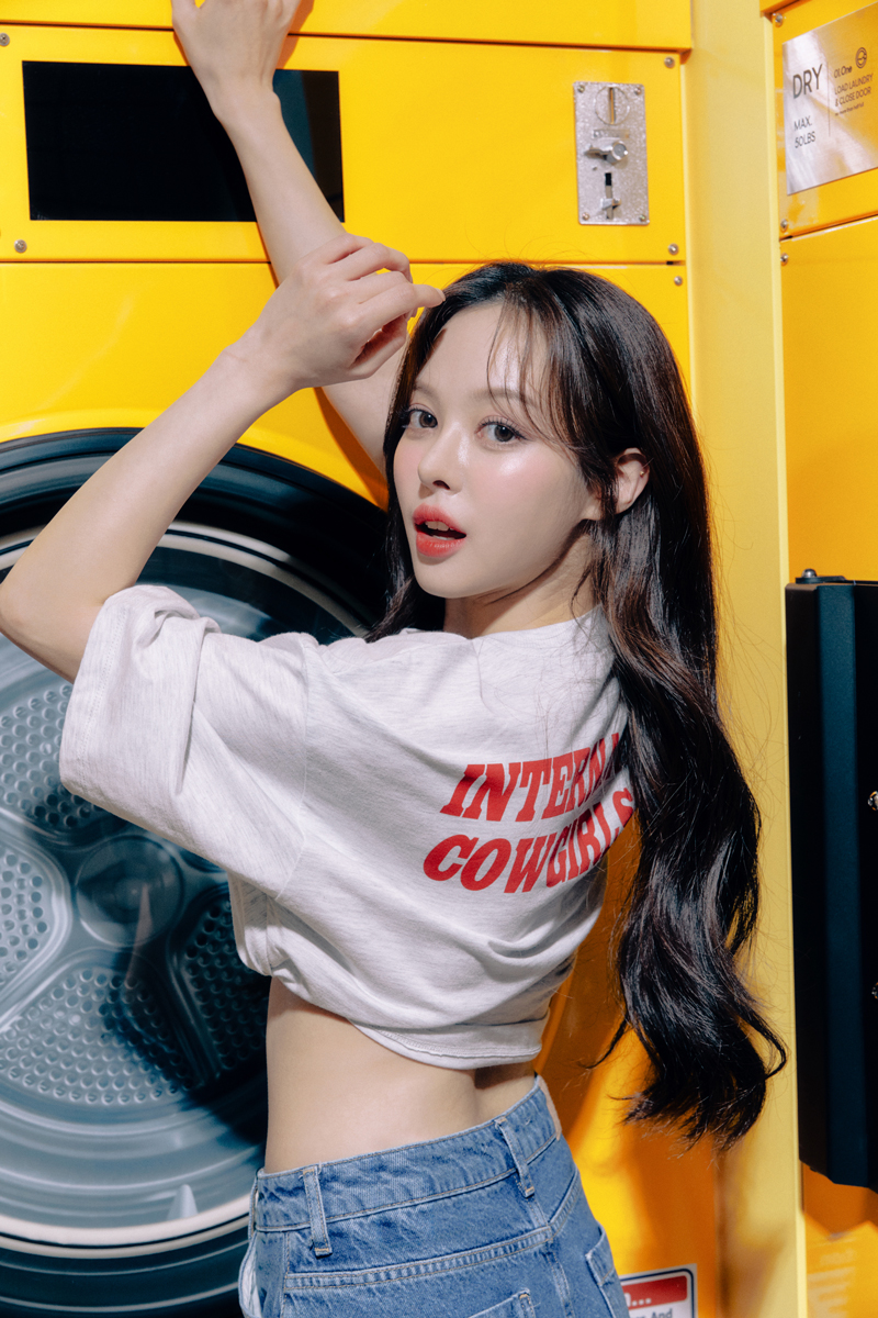 Laundry Booth portrait with yellow dryer set