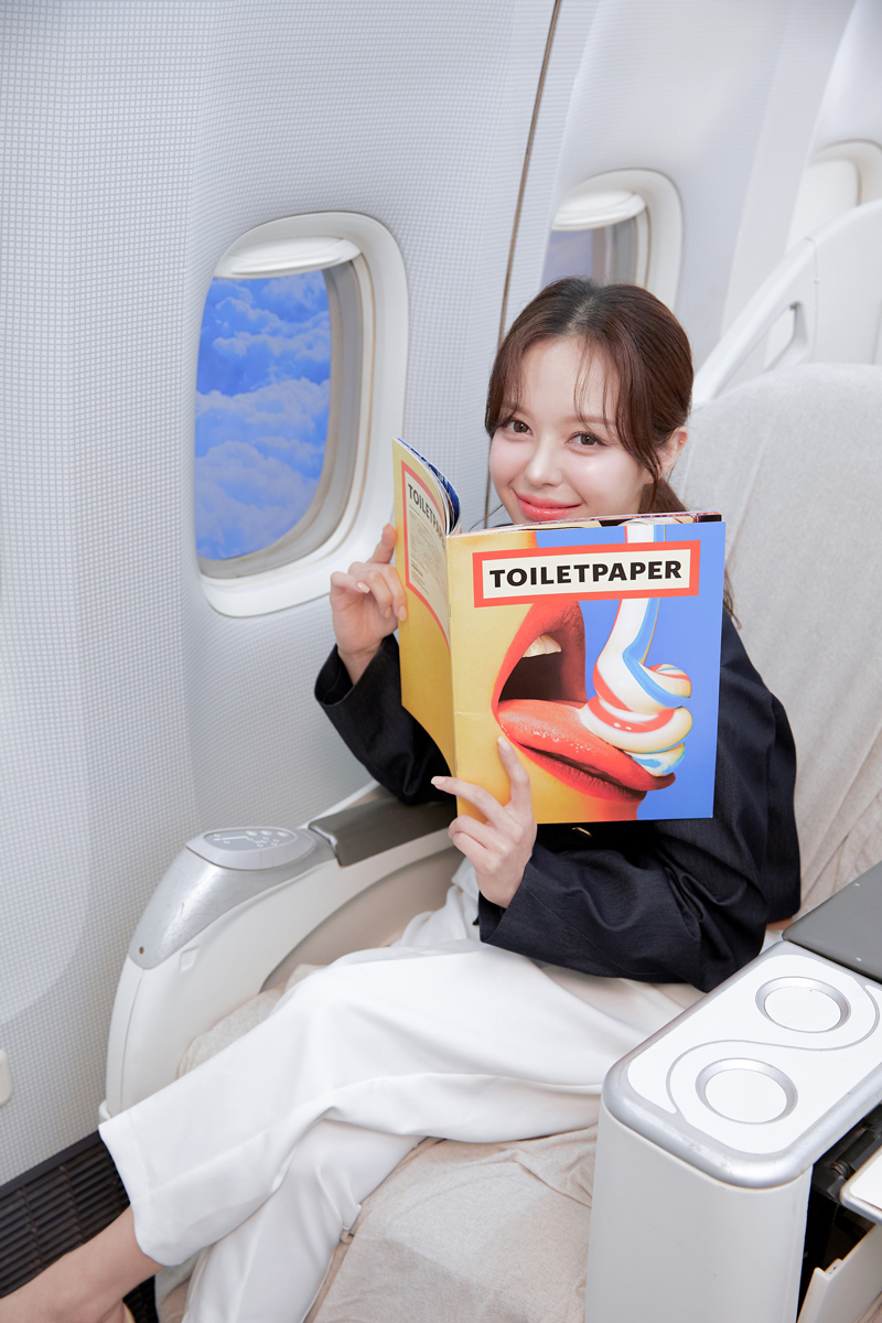 Business Booth portrait in a first-class cabin seat